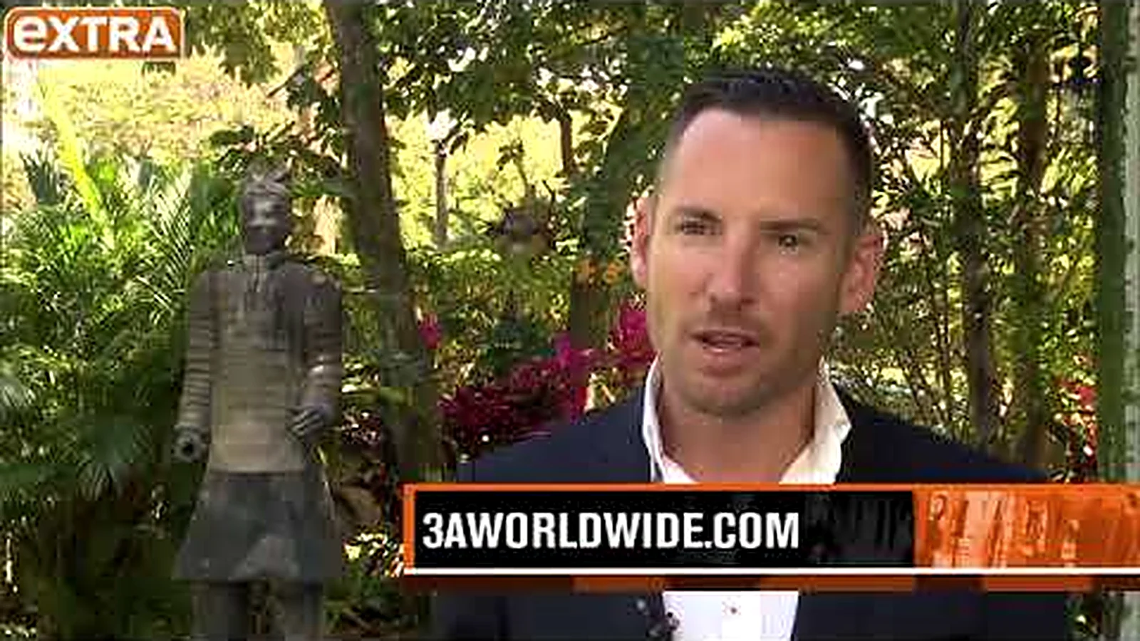 Edward De Valle II interviewed outdoors in Miami for EXTRA, a 3A Worldwide caption on screen